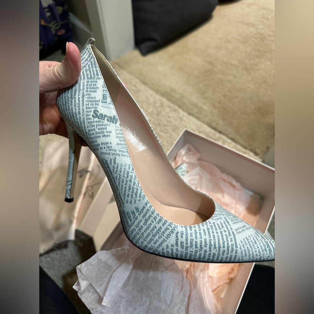 SJP by Sarah Jessica Parker newspaper print pumps
